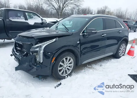 2022 Cadillac Xt4 Awd Premium Luxury from USA, damaged, VIN 1GYFZDR48NF127705